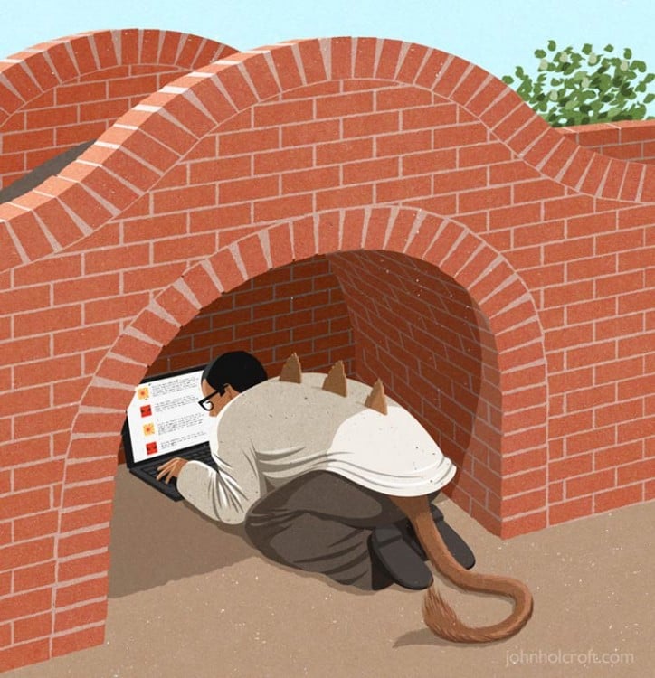hombre con una computadora debajo de un puente