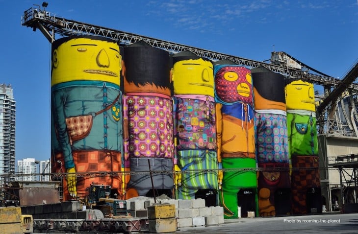 Gemelos Brasileros pintan silos gigantes haciendo murales y arte callejero