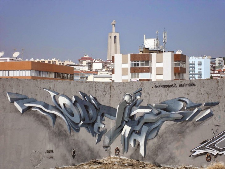 Grafiti en el edificio de una ciudad hecho por un artista portugués 