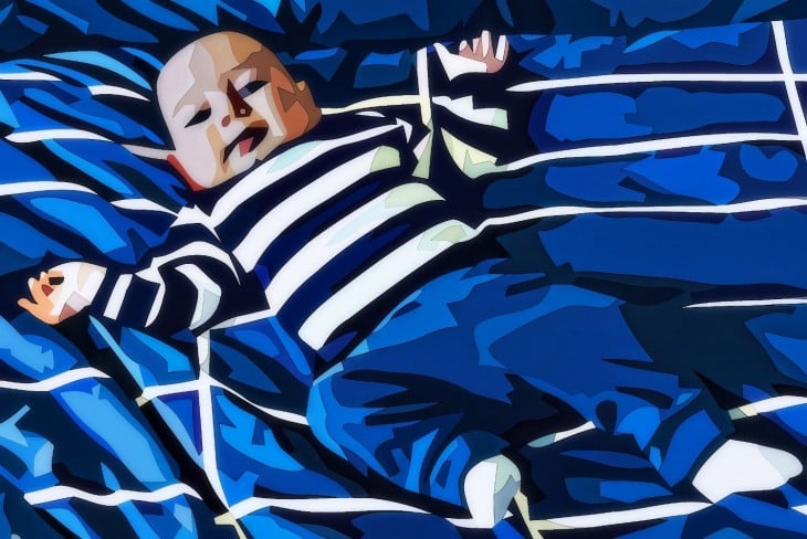 dibujo de un bebe acostado en una cama