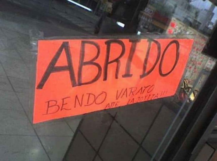 cartel mal escrito abrido en vez de abierto