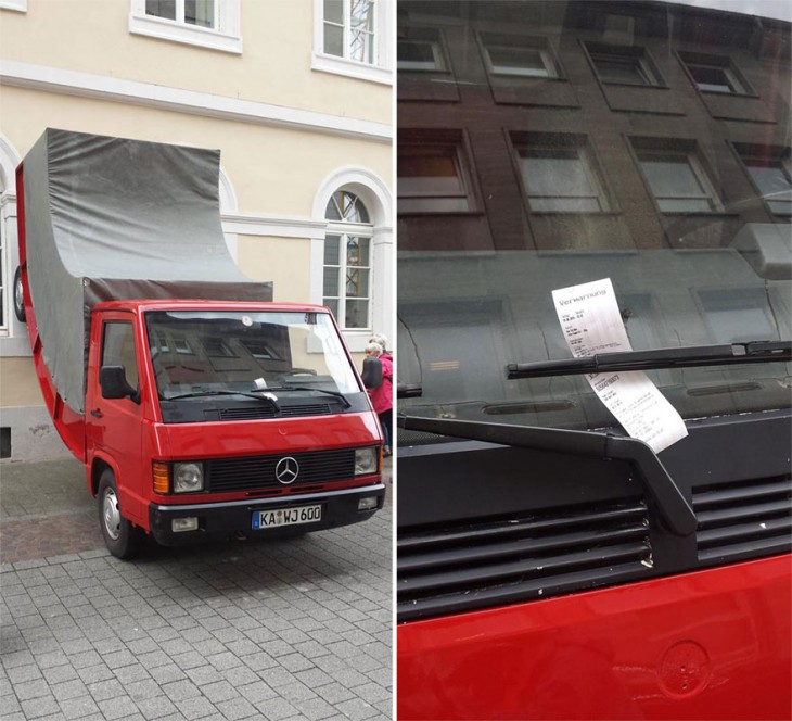 Escultura de un camión doblado en la pared fue multado en Alemania por estar mal estacionado 