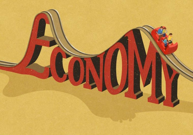 personas en un juego mecánico con las letras Economy 