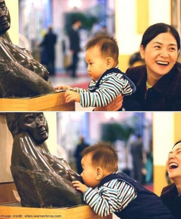 niño que le quiere tomar leche a la estatua