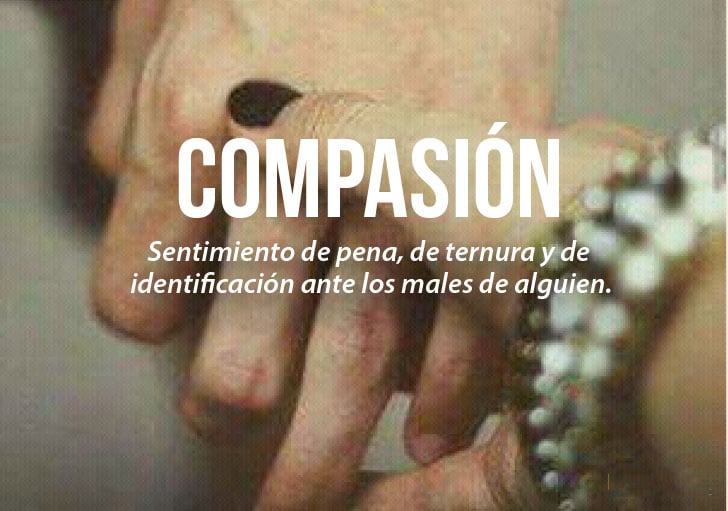 manos de unas personas con la definición de compasión 