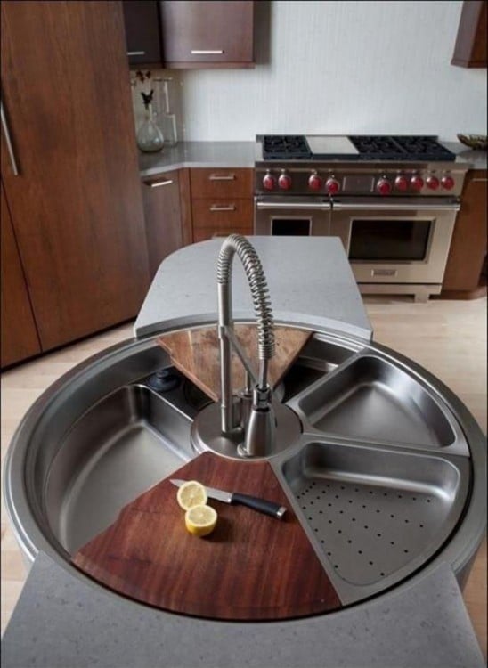 lavabo de cocina giratorio que incluye colador y tabla para picar 