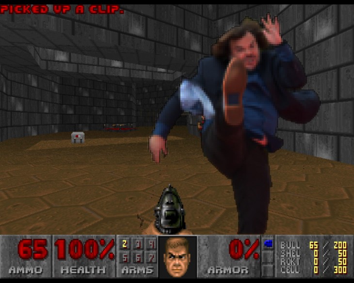 photoshop de jack black tirando una patada dentro de un videojuego 