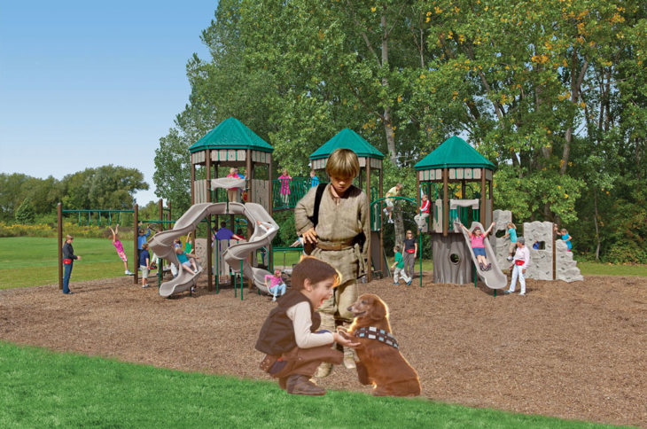 Batalla de Photoshop al niño y su perro vestidos de Han Solo y Chewbacca en un parque lleno de juegos y niños 