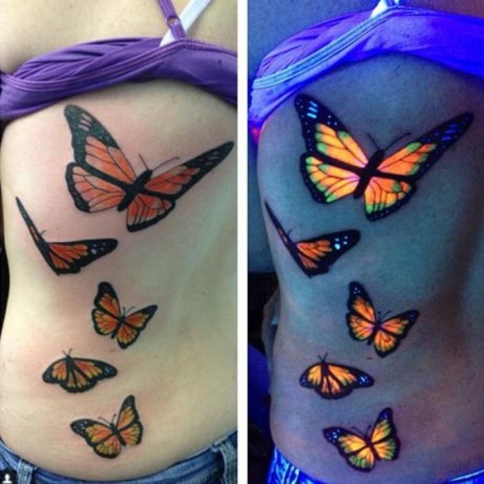 tatuaje con el diseño de mariposas que brillan en la oscuridad 