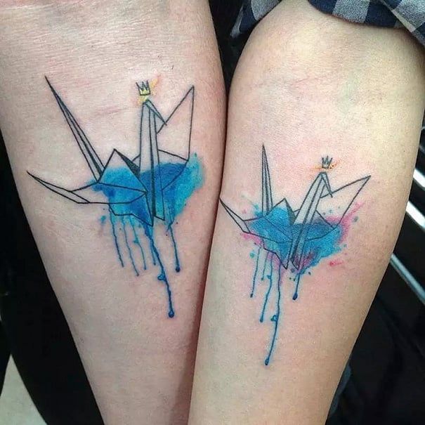 Tatuajes azules de pajaros