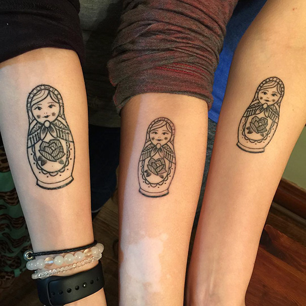 Tatuajes de muñecas china en antebrazo