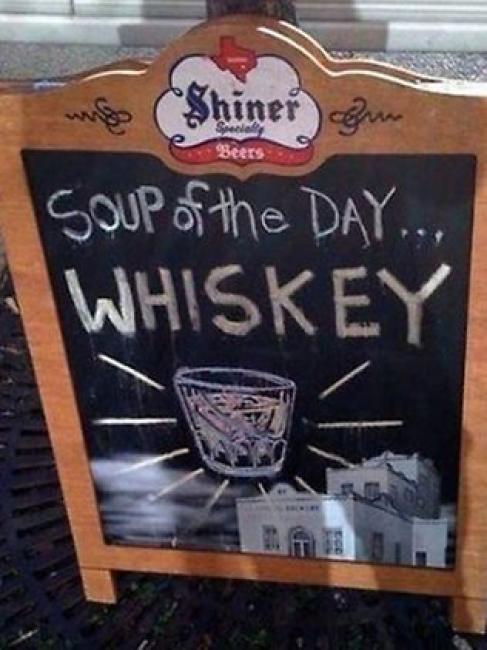anuncio de bar "Whiskey, sopa del día"