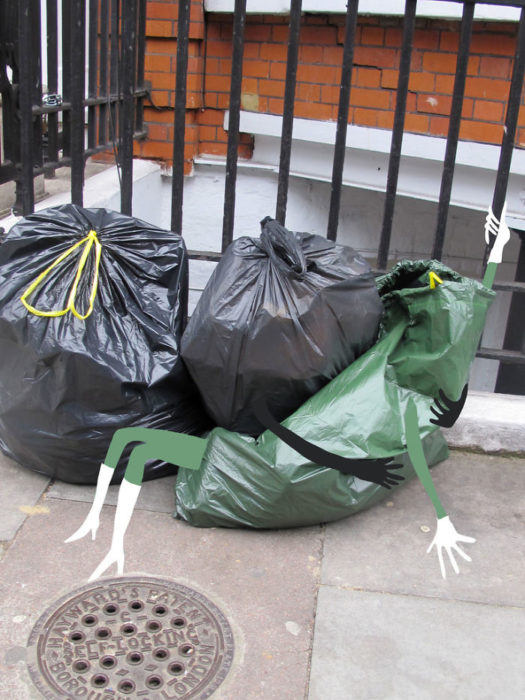 Arte en las calles de París - basura besándose