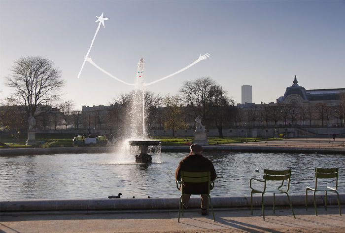 Arte en las calles de París - hada en el lago