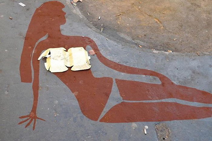 Arte en las calles de París - Mujer tomando el sol