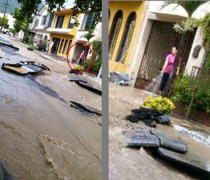 En plena inundación una mujer está regando la calle