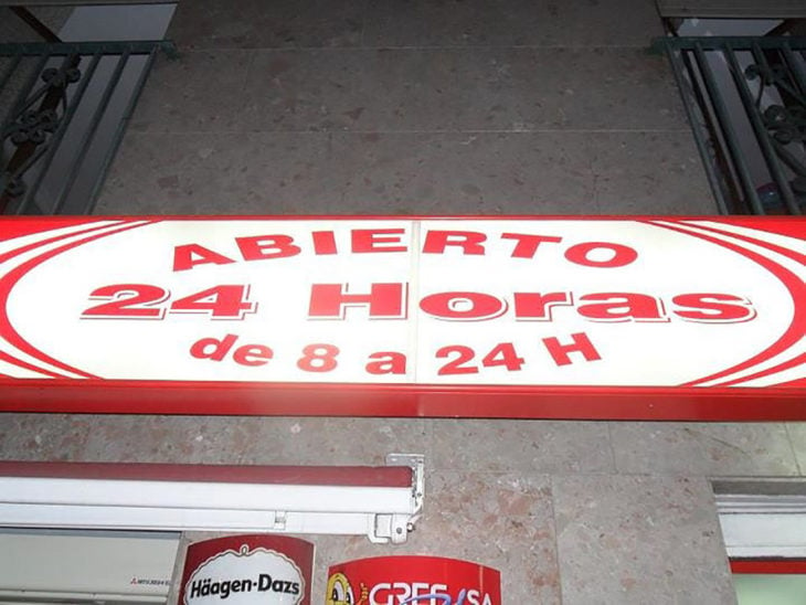 abierto las 24 horas letrero