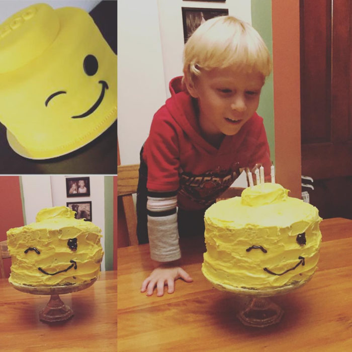 niño soplando su pastel de cumpleaños