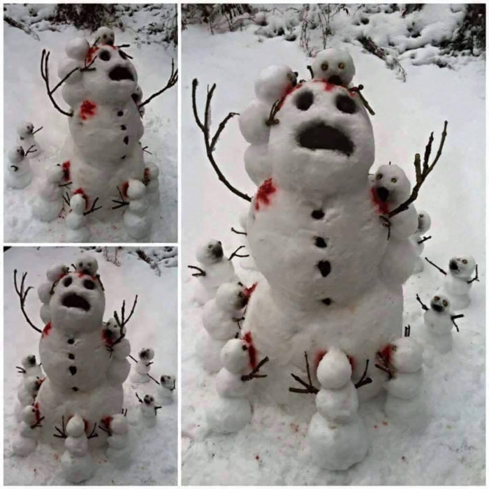 muñecos de nieve decorando a un muñeco de nieve de mayor tamaño