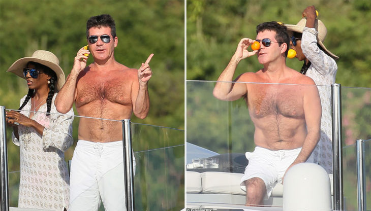 simon cowell hace que habla por teléfono con una banana