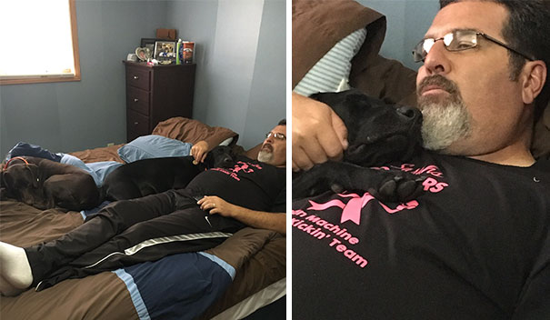 papa acostado en la cama abrazando al perro