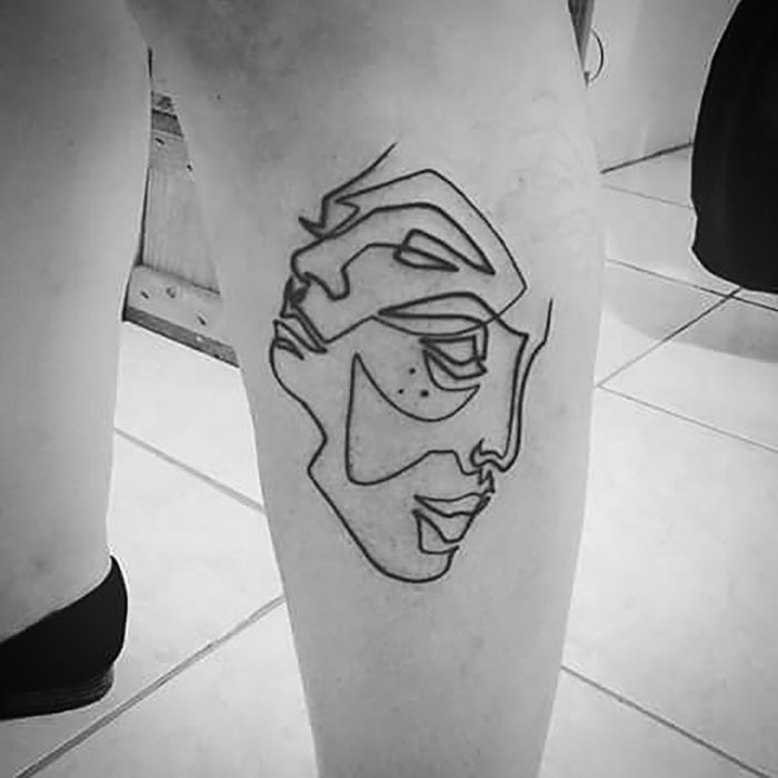 tatuaje de una sola línea de doblecara