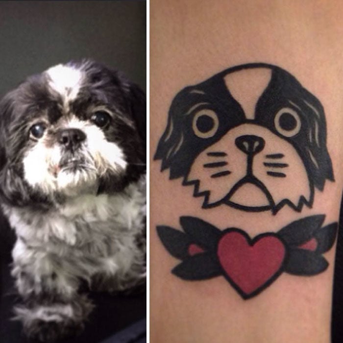 perro blanco con negro tatuaje 