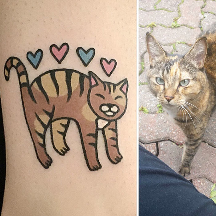 gato sonriendo con corazones tatuaje 