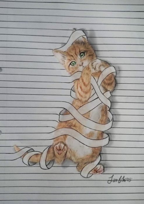 dibujo gato en libreta