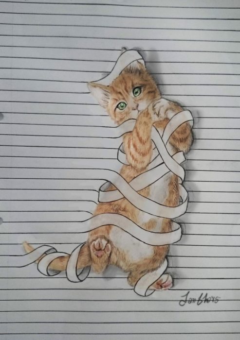 dibujo gato en libreta