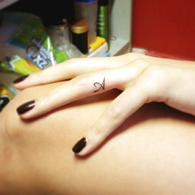 Fingers tattoo