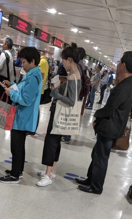 fila de espera en aeropuerto