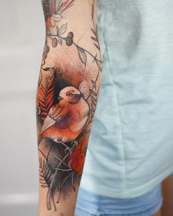 tatuaje de pájaro carmín 