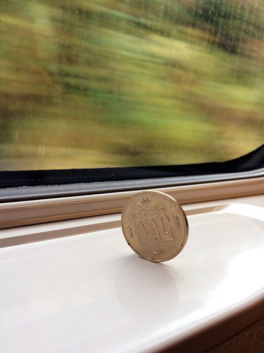 moneda tren bala 